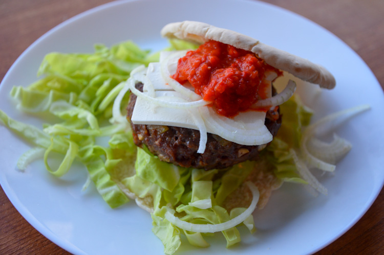 A Balkan burger, our version of pljeskavica, on a plate