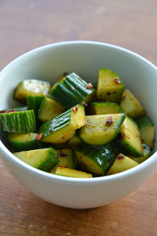 Small white bowl of Sichuan cucumber salad