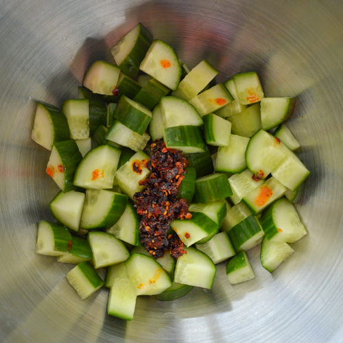 Close up of cucumbers with Sichuan chili oil