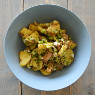 Bowl with German Potato Salad on a table