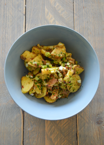 Bowl with German Potato Salad on a table