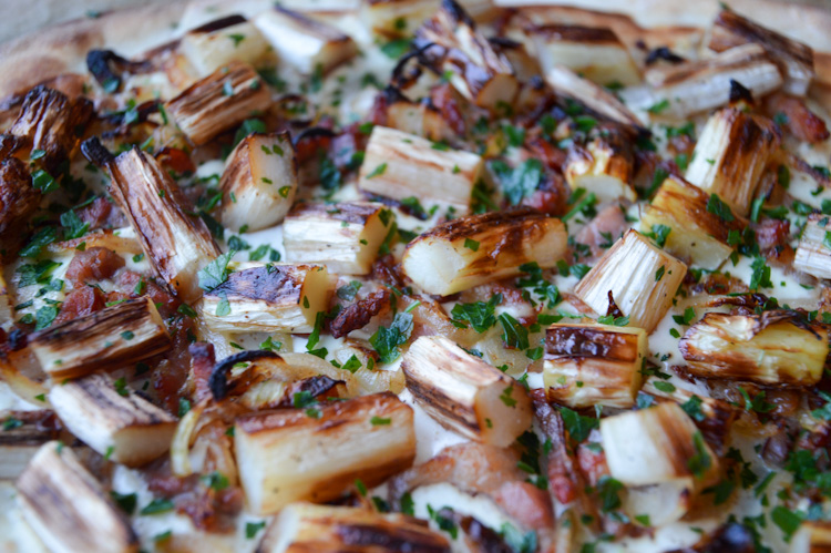 Close up of Flammkuchen with white asparagus