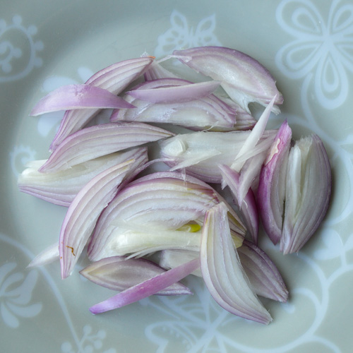 Sliced shallots on a plate