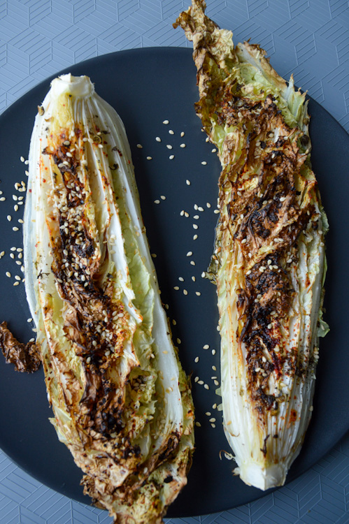 Top down view of roasted Chinese cabbage on a black plate