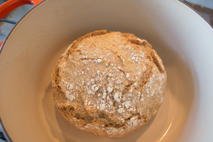 Dutch oven with a no-knead loaf of bread inside
